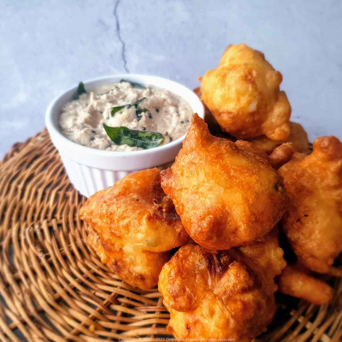 Crispy hot Goli Baje fritters served with coconut chutney
